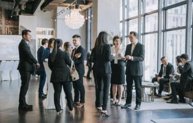 group of real estate agents gather for real estate networking